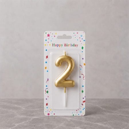 A candle with the shape of the digit two.