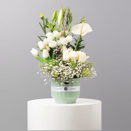 Green flower vase with anthurium, tulip and lily for Saudi National Day