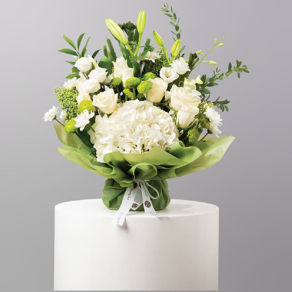 Natural flower bouquet with white hydrangea and roses for Saudi National Day