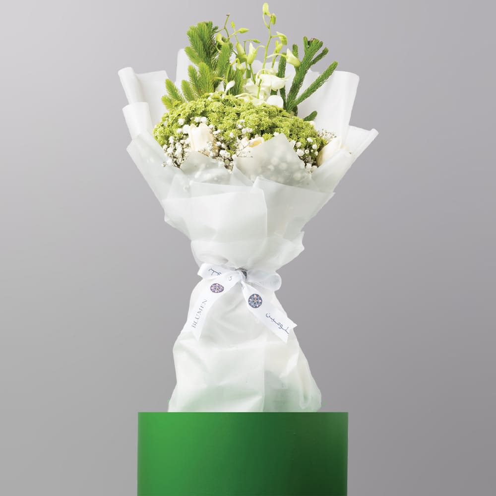 White flower bouquet with tulip and baby orchid in classic white wrap for National Day